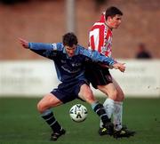 19 December 1999; Ciaran Kavanagh of UCD in action against Darren Kelly of Derry City during the Eircom League Premier Division match between UCD and Derry City at Belfield Park in Dublin. Photo by David Maher/Sportsfile