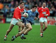 14 November 1999; Colin Moran of Dublin in action against Mark McNeill of Armagh during the Church & General National Football League match between Dublin and Armagh at Parnell Park in Dublin. Photo by Matt Browne/Sportsfile