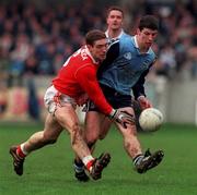 14 November 1999; Colin Moran of Dublin in action against Kieran McGeeney of Armagh during the Church & General National Football League match between Dublin and Armagh at Parnell Park in Dublin. Photo by Matt Browne/Sportsfile