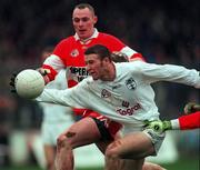 14 November 1999; Colm O'Reilly of Kildare in action against Michael McIvoe of Derry during the Church & General National Football League match between Kildare and Derry at St Conleth's Park in Newbridge, Kildare. Photo by Damien Eagers/Sportsfile