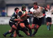 18 December 1999; Dan Gilmore of Barnhall RFC is tackled by Blair Davis, left, and Mick Cassidy of Suttonians RFC during the AIB All-Ireland League Division 4 match between Barnhall RFC and Suttonians RFC at Barnhall RFC in Leixlip, Dublin. Photo by David Maher/Sportsfile
