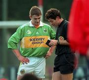 30 October 1999; Enda Galvin of Kerry is booked by referee Brian White during the Church & General National Football League Division 1A Round 1 match between Cork and Kerry at Paric Ui Rinn in Cork. Photo by Brendan Moran/Sportsfile