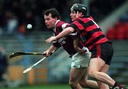 28 November 1999; Ger Hoey of St. Joseph's Doora-Barefield in action against Darragh O'Sullivan of Ballygunner during the AIB Munster Senior Club Hurling Championship Final match between Ballygunner and St. Joseph's Doora-Barefield at Semple Stadium in Thurles, Tipperary. Photo by Ray McManus/Sportsfile