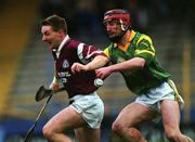 14 November 1999; Jamesie O'Connor of St. Joseph's Doora Barefield in action against George Frend of Toomevara during the AIB Munster Senior Club Hurling Championship Final match between St. Joseph's Doora Barefield and Toomevara at Semple Stadium in Thurles, Tipperary. Photo by Ray McManus/Sportsfile
