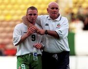 23 July 1999; Gerard Crossley of Republic of Ireland is consoled by coach Noel O'Reilly, right, following the UEFA European Under 18 Championship Group B Round 3 match between Italy and Republic of Ireland at Idrottsparken Stadium in Norrkoping, Sweden. Photo by David Maher/Sportsfile