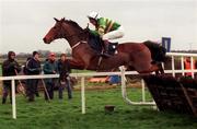 28 November 1999; Istabraq, with Charlie Swan up, clears the first to finish second behind Limestone Lad during the Duggan Brothers Hattons Grace Hurdle at Fairyhouse Racecourse in Ratoath, Meath. Photo by Damien Eagers/Sportsfile