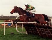 28 November 1999; Istabraq, with Charlie Swan up, clears the last to finish second behind Limestone Lad during the Duggan Brothers Hattons Grace Hurdle at Fairyhouse Racecourse in Ratoath, Meath. Photo by Damien Eagers/Sportsfile