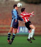 19 December 1999; John Martin of UCD in action against Shaun Gallagher of Derry City during the Eircom League Premier Division match between UCD and Derry City at Belfield Park in Dublin. Photo by David Maher/Sportsfile