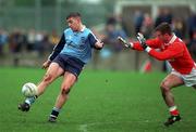 14 November 1999; Jonathan Magee of Dublin in action against Justin McNulty of Armagh during the Church & General National Football League match between Dublin and Armagh at Parnell Park in Dublin. Photo by Matt Browne/Sportsfile