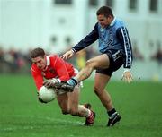 14 November 1999; Kieran McGeeney of Armagh in action against Mick O'Keeffe of Dublin during the Church & General National Football League match between Dublin and Armagh at Parnell Park in Dublin. Photo by Matt Browne/Sportsfile
