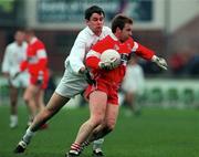 14 November 1999; Kieran McKeever of Derry in action against Karl O'Dwyer of Kildare during the Church & General National Football League match between Kildare and Derry at St Conleth's Park in Newbridge, Kildare. Photo by Damien Eagers/Sportsfile