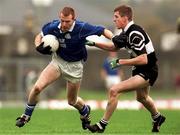 7 November 1999; Liam Hassett of Laune Rangers in action against Conor Whelan of Doonbeg during the AIB Munster Senior Club Football Championship semi-final match between Doonbeg and Laune Rangers at Fitzgerald Stadium in Killarney, Kerry. Photo by Ray Lohan/Sportsfile