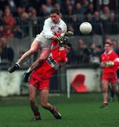 14 November 1999; Mark Milham of Kildare in action against Paul McFlynn of Derry during the Church & General National Football League match between Kildare and Derry at St Conleth's Park in Newbridge, Kildare. Photo by Damien Eagers/Sportsfile