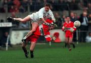 14 November 1999; Mark Milham of Kildare in action against Paul McFlynn of Derry during the Church & General National Football League match between Kildare and Derry at St Conleth's Park in Newbridge, Kildare. Photo by Damien Eagers/Sportsfile