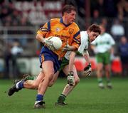 21 November 1999; Mick Galvin of Na Fianna in action against Colm O'Keeffe of Portlaoise during the AIB Leinster Senior Club Football Championship Semi-Final match Na Fianna and Portlaoise at St Conleth's Park in Newbridge, Kildare. Photo by Brendan Moran/Sportsfile