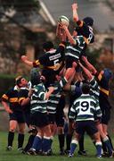 27 November 1999; Paul Kelly of Suttonians RFC takes the ball in the lineout from Stephen Nelson, left, and and Andy Brown of Banbridge RFC during the AIB All-Ireland League Division 4 match between Suttonians RFC and Banbridge RFC at the McDowell Grounds in Sutton, Dublin. Photo by Matt Browne/Sportsfile