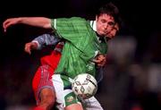 13 November 1999; Robbie Keane of Republic of Ireland in action against Tayfun Korkut of Turkey during the UEFA European Championships Qualifier Play-Off First Leg match between Republic of Ireland and Turkey at Lansdowne Road in Dublin. Photo by David Maher/Sportsfile