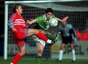13 November 1999; Kermoglw Tugay of Turkey in action against Robbie Keane of Turkey during the UEFA European Championships Qualifier Play-Off First Leg match between Republic of Ireland and Turkey at Lansdowne Road in Dublin. Photo by David Maher/Sportsfile