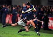 19 November 1999; Shane Horgan of Leinster is tackled by Geordan Murphy of Leicester Tigers during the Heineken European Cup Pool 1 match between Leinster and Leicester Tigers at Donnybrook Stadium in Dublin. Photo by Brendan Moran/Sportsfile