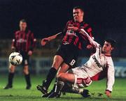 12 December 1999; Stephen Caffrey of Bohemians is tackled by Michael Quire of Galway United during the Eircom League Premier Division match between Bohemians and Galway United at Dalymount Park in Dublin. Photo by Ray McManus/Sportsfile
