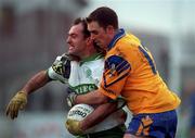 21 November 1999; Thomas Conroy of Portlaoise is tackled by Karl Donnelly of Na Fianna during the AIB Leinster Senior Club Football Championship Semi-Final match Na Fianna and Portlaoise at St Conleth's Park in Newbridge, Kildare. Photo by Brendan Moran/Sportsfile