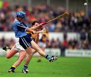30 May 1999; Tomás McGrane of Dublin in action against Adrian Fenlon of Wexford during the Guinness Leinster Senior Hurling Championship Quarter-Final match between Dublin and Wexford at Nowlan Park in Kilkenny. Photo by Ray Lohan/Sportsfile