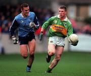 28 November 1999; Tomás Ó Sé of Kerry in action against Ciaran Whelan of Dublin during the Church & General National Football League match between Dublin and Kerry at Parnell Park in Dublin. Photo by Aoife Rice/Sportsfile