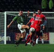 13 November 1999; Roy Keane of Republic of Ireland in action against Yalcin Sergen of Turkey during the UEFA European Championships Qualifier Play-Off First Leg match between Republic of Ireland and Turkey at Lansdowne Road in Dublin. Photo by David Maher/Sportsfile