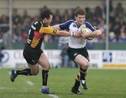 13 April 2007; Leinster centre Gordon D'arcy tries to hand off Dragons scrum-half Gareth Cooper. Magners League, Newport Gwent Dragons v Leinster, Rodney Parade, Newport, Gwent, Wales. Picture credit; Tim Parfitt / SPORTSFILE