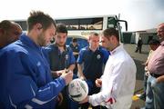 14 April 2007; Glentoran's Gary Hamilton gets a football signed by some of the Linfield team. Carnegie Premier League, Glentoran v Linfield, The Oval, Belfast, Co. Antrim. Picture credit; Russell Pritchard / SPORTSFILE