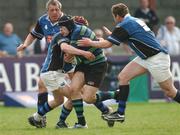 14 April 2007; Jonathan Walsh, Seapoint, is tackled by Gareth Cochrane and Johnny Gault, no. 5, Coleraine. AIB Junior Cup Final, Seapoint v Coleraine, Dubarry Park, Athlone, Co. Westmeath. Picture credit; Matt Browne / SPORTSFILE