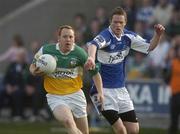14 April 2007; Thomas Coughlan, Offaly, in action against Stephen Lalor, Laois. Cadbury U21 Ulster Football Final, Laois v Offaly, O'Moore Park, Portlaoise, Co. Laois. Picture credit; Pat Murphy / SPORTSFILE