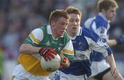 14 April 2007; Sean Ryan, Offaly, in action against Cahir Healy, Laois, on his way to scoring his side's first goal. Cadbury U21 Leinster Football Final, Laois v Offaly, O'Moore Park, Portlaoise, Co. Laois. Picture credit; Pat Murphy / SPORTSFILE