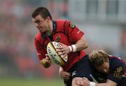 14 April 2007; Mossie Lawlor, Munster, is tackled by Matthew Watkins, Llanelli Scarlets. Magners League, Munster v Llanelli Scarlets, Musgrave Park, Cork. Picture credit; Brendan Moran / SPORTSFILE