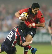 14 April 2007; Lifeimi Mafi, Munster, is tackled by Barry Davies, Llanelli Scarlets. Magners League, Munster v Llanelli Scarlets, Musgrave Park, Cork. Picture credit; Brendan Moran / SPORTSFILE