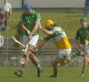 15 April 2007; Brian Begley, Limerick, in action against Ger Oakley, Offaly. Allianz National Hurling League, Division 1, Relegation Play-Off, Offaly v Limerick, McDonagh Park, Nenagh, Co. Tipperary. Picture credit; Pat Murphy / SPORTSFILE