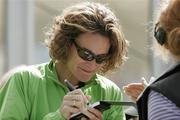 15 April 2007; Sonia O'Sullivan signs an autograph before the start of the BUPA Great Ireland Run. Phoenix Park, Dublin. Picture credit; Tomas Greally / SPORTSFILE