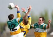 15 April 2007; Michael Finneran, Roscommon, in action against Scott Brady, right, and Ciaran McManus, Offaly. Allianz National Football League, Division 2A, Offaly v Roscommon, O'Connor Park, Tullamore, Co. Offaly. Picture credit; Brian Lawless / SPORTSFILE
