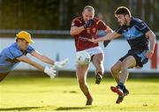 18 October 2014; Gareth Smith, St Oliver Plunkett’s-Eoghan Ruadh, in action against John Brian Carthy, left, and Oisin Manning, St Jude’s. Dublin County Senior Football Championship, Semi-Final, St Oliver Plunkett’s-Eoghan Ruadh v St Jude’s, Parnell Park, Dublin. Picture credit: Stephen McCarthy / SPORTSFILE