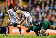 18 October 2014; Stuart Olding, supported by Jared Payne, Ulster, is tackled by Robert Barbieri, Leicester Tigers. European Rugby Champions Cup 2014/15, Pool 3, Round 1, Leicester Tigers v Ulster, Welford Road, Leicester, England. Picture credit: Ramsey Cardy / SPORTSFILE