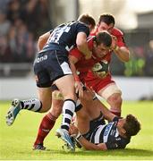 18 October 2014; CJ Stander, Munster, with support from team-mate Peter O'Mahony, is tackled by Michael Haley, left, and Chris Cusiter, Sale Sharks. European Rugby Champions Cup 2014/15, Pool 1, Round 1, Sale Sharks v Munster, AJ Bell Stadium, Sale, Greater Manchester, England. Picture credit: Brendan Moran / SPORTSFILE