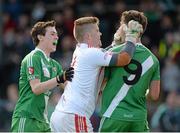 19 October 2014; Marc Prior, Athy goalkeeper, during an altercation with Cian Scanlon, left, and Ben McCormack, Sarsfields, during the game. Kildare County Minor A Football Championship Final, Athy v Sarsfields. St Conleth's Park, Newbridge, Co. Kildare. Picture credit: Piaras Ó Mídheach / SPORTSFILE