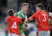 19 October 2014; Athy's Niall Foley, left, and Mark Hyland, right, in an altercation with Cian Costigan, Sarsfields, during the game. Kildare County Minor A Football Championship Final, Athy v Sarsfields. St Conleth's Park, Newbridge, Co. Kildare. Picture credit: Piaras Ó Mídheach / SPORTSFILE