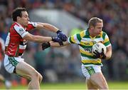 19 October 2014; Seamus Hayes, Carbery Rangers, in action against Liam Jennings, Ballincollig. Cork County Senior Football Championship Final, Ballincollig v Carbery Rangers, Pairc Ui Chaoimh, Cork. Photo by Sportsfile