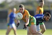 19 October 2014;  Ronan Steede, Corofin, in action against Jamie Downes, St Michael's. Galway County Senior Football Championship Final, Corofin v St Michael's, Tuam Stadium, Tuam, Co. Galway. Picture credit: Ray Ryan / SPORTSFILE