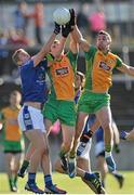 19 October 2014; Liam Silke and Ronan Steede, Corofin, in action against Eammon O'Donnell, St Michael's. Galway County Senior Football Championship Final, Corofin v St Michael's, Tuam Stadium, Tuam, Co. Galway. Picture credit: Ray Ryan / SPORTSFILE
