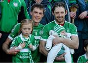 19 October 2014; Kilmallock's Gavin O'Mahony, left, with his niece Ella O'Mahony, aged 4, and Paudie O'Brien with his four-month-old daughter Fiadh O'Brien, celebrating after the game. Limerick County Senior Hurling Championship Final, Na Piarsaigh v Kilmallock, Gaelic Grounds, Limerick. Picture credit: Diarmuid Greene / SPORTSFILE