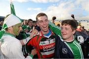 19 October 2014; Cian Kiely, Ballincollig, is congratulated by supporters after the game. Cork County Senior Football Championship Final, Ballincollig v Carbery Rangers, Pairc Ui Chaoimh, Cork. Photo by Sportsfile