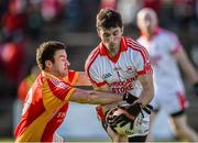 19 October 2014;  Paul Earley, Ballintubber, in action against Niall Lydon, Castlebar Mitchels. Mayo County Senior Football Championship Final, Castlebar Mitchels v Ballintubber, MacHale Park, Castlebar, Co. Mayo. Picture credit: David Maher / SPORTSFILE