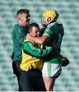 19 October 2014; Jake Mulcahy, Kilmallock, celebrates with team-mate Eoin Webb O'Rourke, left, selector Adrian O'Brien, after victory over Na Piarsaigh. Limerick County Senior Hurling Championship Final, Na Piarsaigh v Kilmallock, Gaelic Grounds, Limerick. Picture credit: Diarmuid Greene / SPORTSFILE